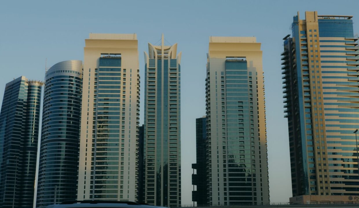 High-rise glass buildings against a clear sky